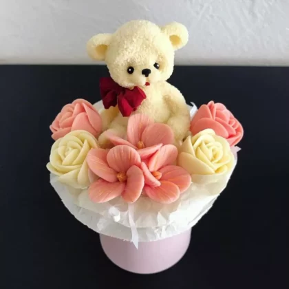 Petit bouquet avec figurine d'ourson en chocolat