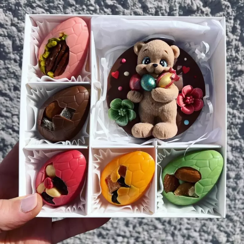 Coffret Pâques comprenant un ourson et 5 œufs en chocolat